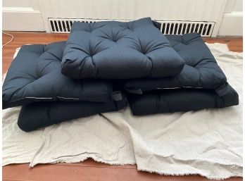 Grouping Of Black Indoor Seat Cushions