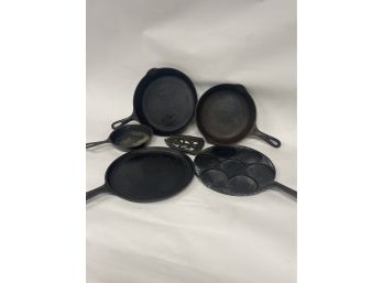 Grouping Of Cast Iron Skillets