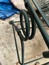 Two Green Metal Patio Chairs And Table