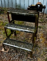 Metal Grate Stairs And Heavy Large Mounted Vise
