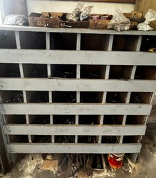 Cubby Shelf Filled With Nuts Bolts Nails And Other