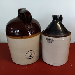 Two Stoneware Jugs: 1 Gal W/ Crown Mark, 2 Gal, No Cracks