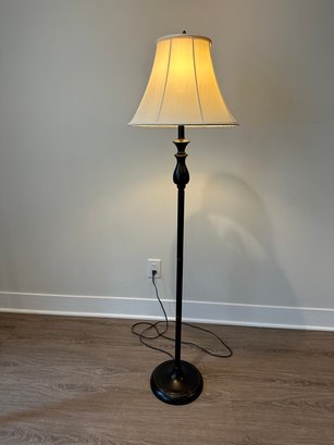 A Bronze Tone Floor Lamp