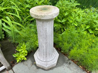 A Cement Pillar Plant Stand