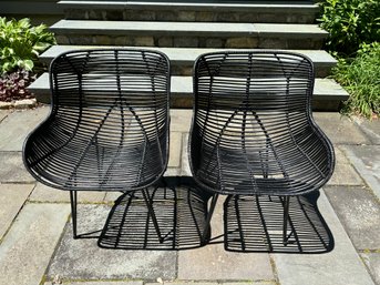 Two Black Rattan Chairs