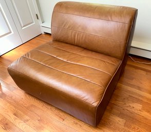A Brown Leather Lounge Chair