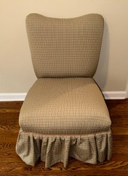 A Custom Upholstered Skirted Accent Chair