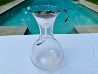 A Glass Wine Decanter With Funnel