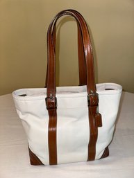 A Coach White And Tan Leather Tote Bag