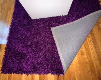 A Purple Shag Area Rug 5 X 8