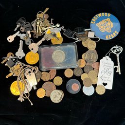 Keys, Tokens And Coin Paperweights