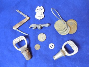 Miscellaneous Lot Of Antique Brass Number Tags, Moxie Bottle Openers, Fruit Knife ? , Badge, Etc.