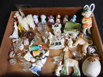 Lot Of Small Porcelain And Ceramic Figurines Including Women Giraffe, Wolf, And Bunny.