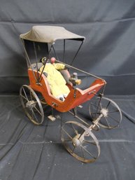 Vintage Doll Wagon With Black Fabric Doll.