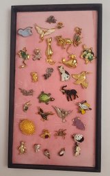 Pink Display Tray Of Animal Pins And Brooches