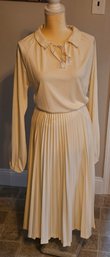 1970s 'Sultry Knit' Two Piece Skirt And Top Set Cream