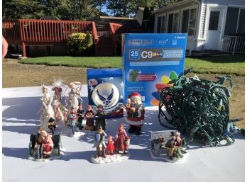 Lot Of Christmas Lights And Statues