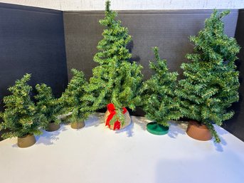 4 Small Christmas Trees