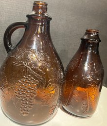 2 Maywood Glass Amber Cameo Grapevine Bottles, 1 Gallon And 1/2 Gallon