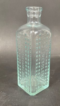 Vintage Embossed Blue Glass Bottle