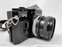 Vintage Canon F1 - Untested With Canon FD 50mm 1.1.8 SC Lens And Camera Strap