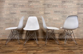 Set Of Four White Shell Chairs With Metal Base