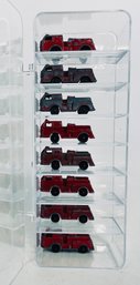 Display Case Of Toy Fire Trucks Cast Metal