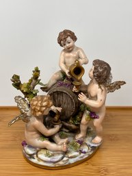 Group Of Putti With Grapes In Polychrome Porcelain Italian