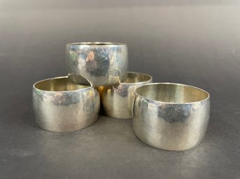 Group Of 4 Sterling Silver Shields Hammered Silver Napkin Rings