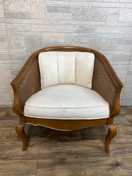 Upholstered Cane Back Barrel Chair