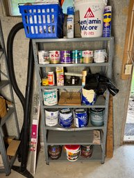 Shelf Full Of Paint And Household Chemicals