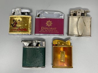 Lot Of Five Vintage Lighters Including Orioles, Diplomat Hotel And More