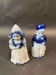 Pair Of Flow Blue Figurines