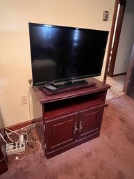 30' LG Flatscreen Television With Two Door Tv Stand