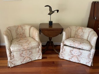 Pair Of Upholstered Swivel Barrel Style Chairs