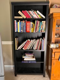 Large Black Wooden Bookshelf With Contents