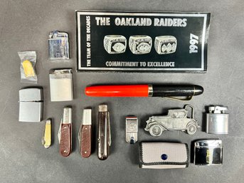 Lot Of Collectibles Including Pocket Knives, Lighters, Belt Buckle And More