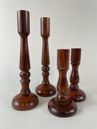 Group Of Rosewood Candlesticks