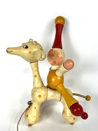 Vintage Wooden Toy Clown On Giraffe