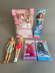Collection Of Barbie And Ken Figures