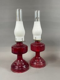 Pair Of Cranberry Glass Oil Lamps