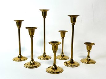 7 Brass Candlesticks In Different Sizes In The Same Design