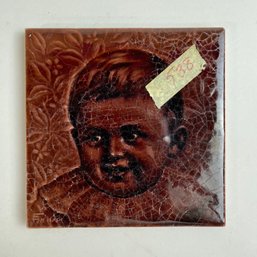 Arts & Crafts Figural Pottery Tile Of A Boy