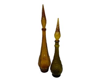 A Pair Of Mid Century Amber Colored Decanters Attributed To Empoli