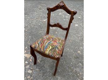 Antique Upholstered Chair With Vibrant Color
