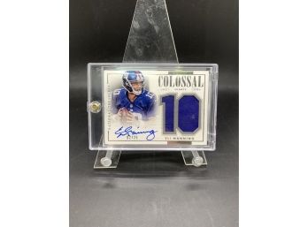 2014 Panini National Treasures Colossal Eli Manning Player Worn Material Autograph Card Numbered 02/25