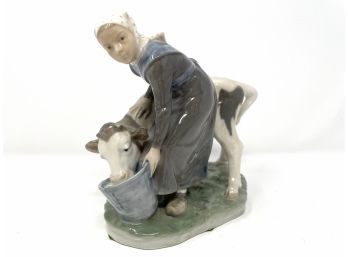 Royal Copenhagen 779 Girl With Calf Figurine