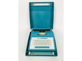 Super International 'Petite' Turquoise Typewriter With Case