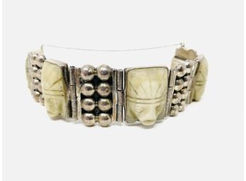 Mid Century Modern Heavy Mexican Silver Bracelet With Carved Stone Faces