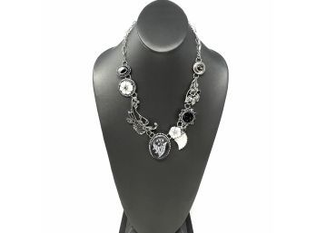 Artisan Signed Sterling Silver Necklace W Bezel Set Black, Gray, And White Stones Featuring A Floral Motif